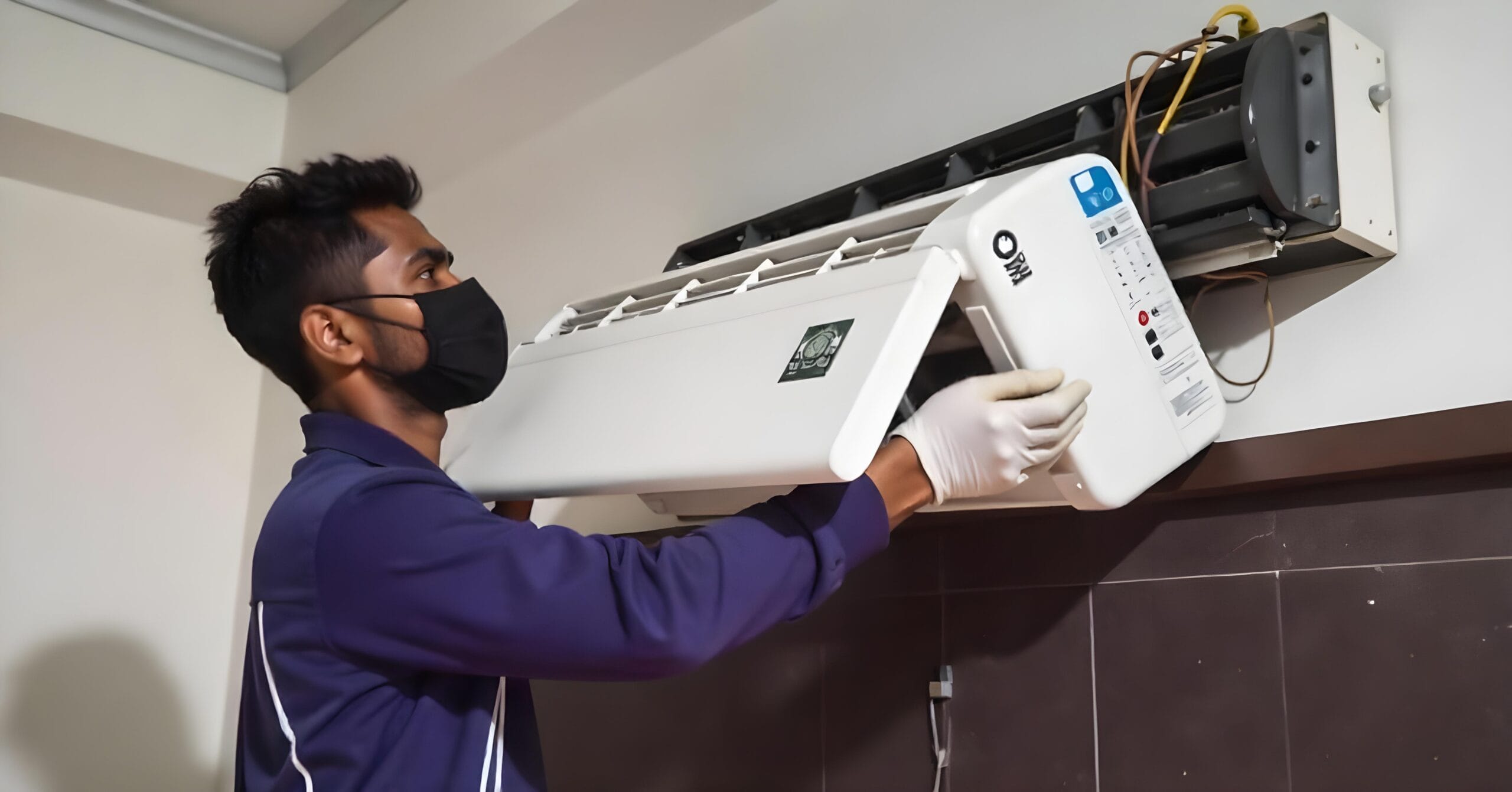freepik__an-indian-man-30-years-old-with-a-mask-and-gloves-__21834